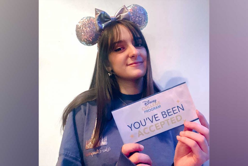 Photo of Morgan Rich with silver sparkle Mickey Mouse ears